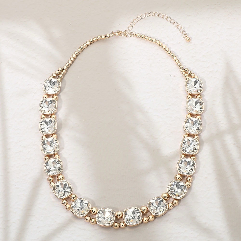 Elegant Gold Bezel Set Stones Evening Wear